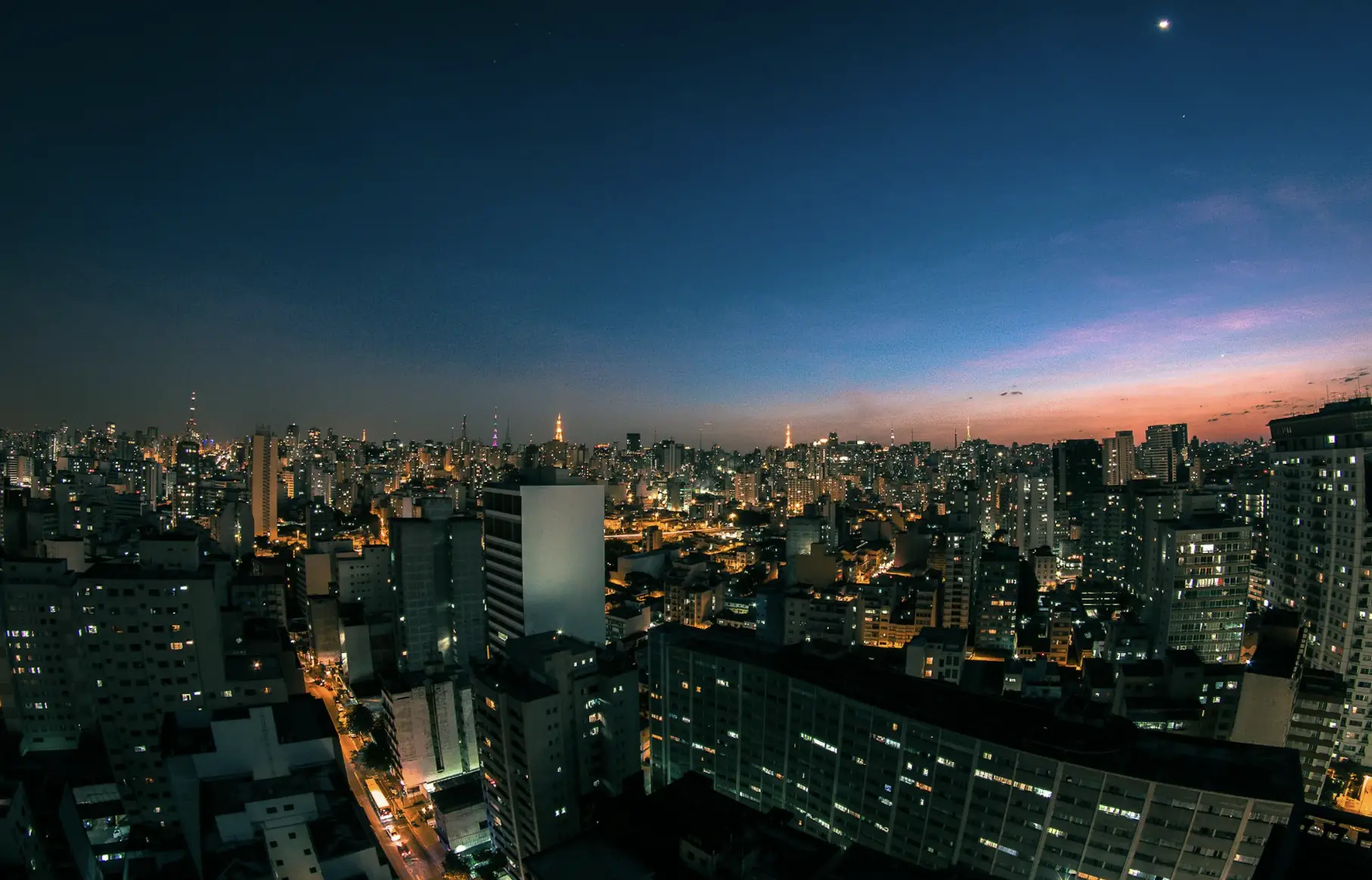 Urban Growth Reflecting Medical Billing Companies in Philippines Panoramic view of a Philippine cityscape at dusk, symbolizing the growth and innovation of medical billing companies in Philippines